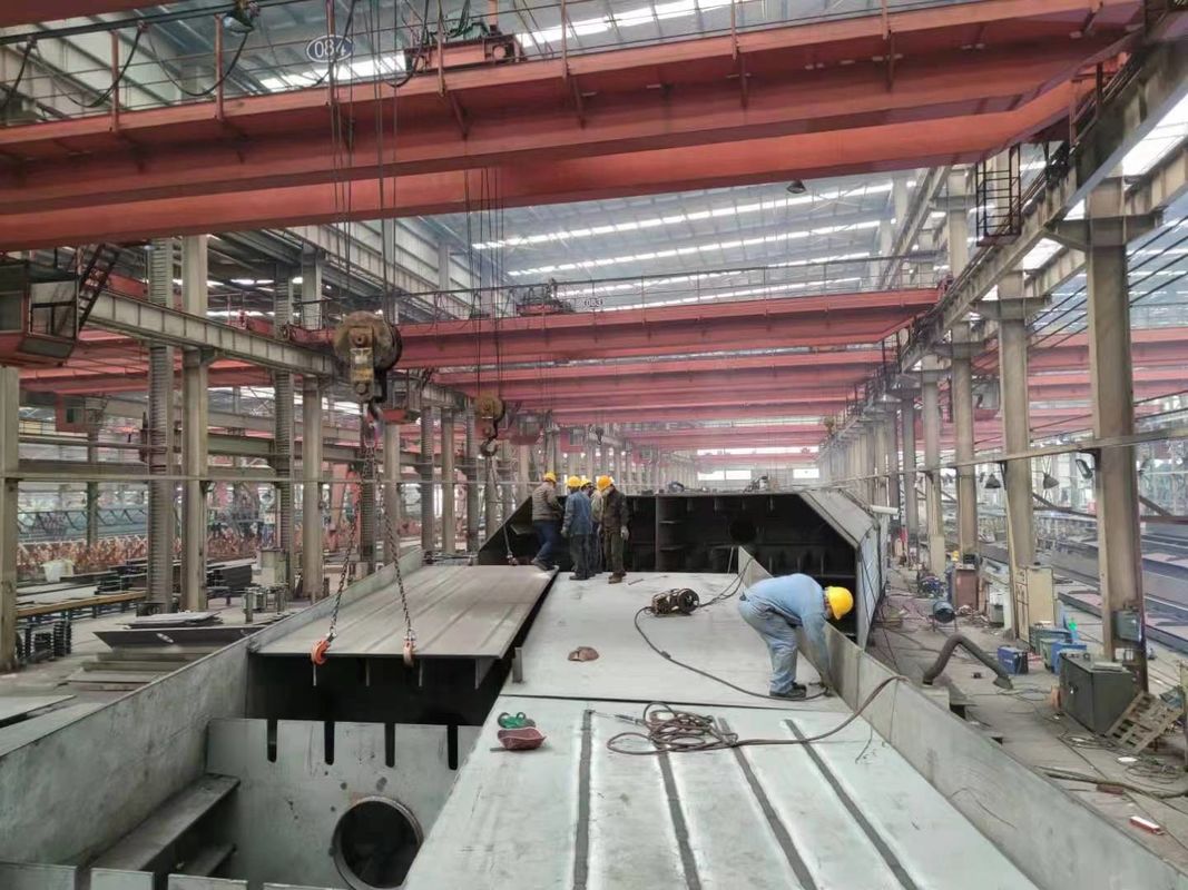 Xây dựng kho thép được thiết kế cho tòa nhà cao và trải dài lớn với Xưởng chế tạo cấu trúc thép sẵn chống bão
